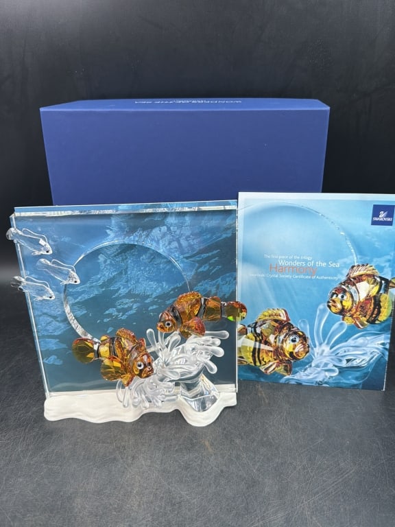 Swarvsoki Wonder of the Sea "Harmony": Set features 2 colored clown fish nestled within a clear crystal coral base. Comes with original box and papers. See pictures, measures about 7 3/4 inches high by 7 inches long and 4 inches wide. No