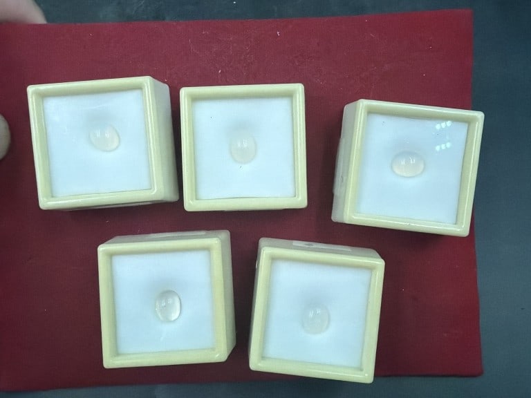 Gemstones: There is a total of 5 opals in protective cases. Brazilian Fire Opals, see pictures. Condition is good, no refunds given.