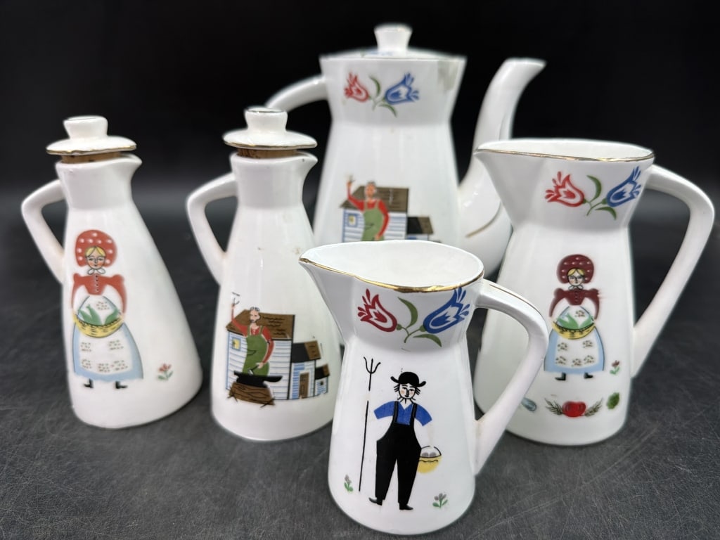 Royal Sealy "Penn Dutch" Line: Ceramic pitchers and cruets. Hand Painted folk art designs. Total of 5 pieces, see pictures Measures 6" pitcher to 3 1/4". No refunds given.