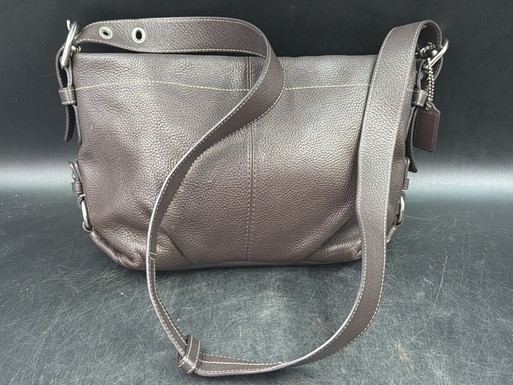 Leather Coach Hobo Shoulder Handbag or Cross Body: Brown leather in good condition. Model F15064 and pebble leather. Condition is good, see picturs. No refunds given.