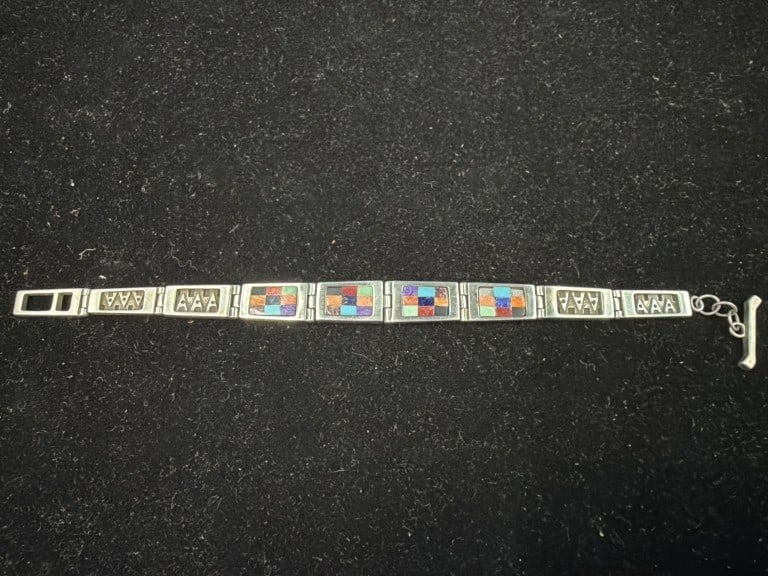 Vintage Sterling Silve Link Bracelelt: Features intricate checkerboard style mosaic inlay consisting of semi precious stones like turquoise, lapis, spiny oyster and variscite. Weighs 30.8g and see pictures 2 small stones missing but doesn'
