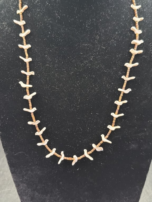 Native American Fetish Necklace: Hand carved white shell fetish birds and delicate heishi beads. Measures about 25" and condition is good. See pictures, no refunds given.