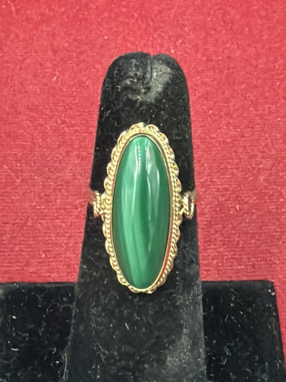 Vintage Yellow Gold Ring: Vertically set malachite stone cabochon in delicate beaded 14k gold bezel setting. Ring is a size 5 and weighs 4.0g. Condition appears good, see pictures. No refunds given.