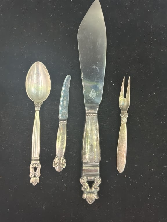 Georg Jensen Sterling Items: Total of 4 in this lot, There is a vintage spoon, cake cutter, knife and lemon fork. Total weight of these pieces is 205.6 g with blades. See pictures, no refunds given.