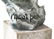 Baked clay sculpture represents a man sitting . Signed - 3