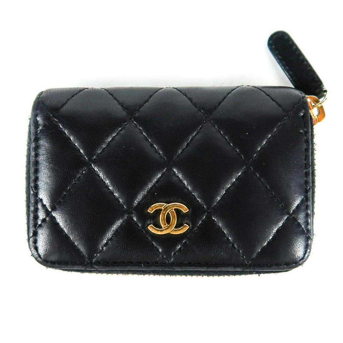 Chanel - Card Holder Zip Wallet - Black Lambskin: Chanel - CC Mini Card Holder Wallet - Color: Black - Material: Lambskin Leather - Size: Small - Details: CC logo - Zip-around - card holder - gold-tone hardware - dust bag included - item # AA2715 - C