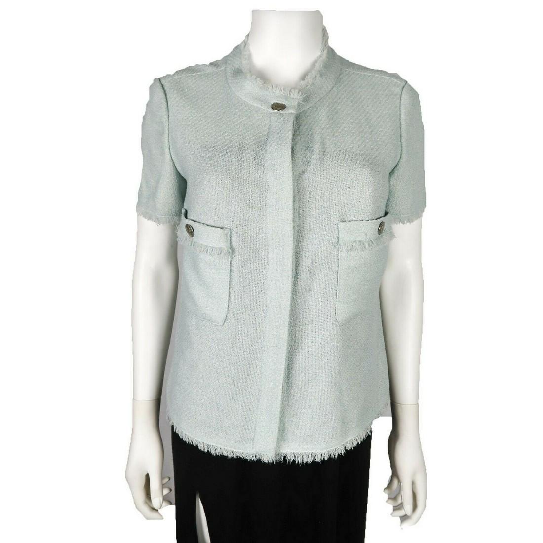 Chanel - Short Sleeve Spring Trim Jacket - Light Blue: Chanel - Spring Short Sleeve Trim Two Pocket Jacket - 08C Size: US 8 - 40 Color: Light Blue Material: Wool Blend Details: CoCo Line buttons- wool blend trim- two pocket- item # AA2701 Condition: Excel