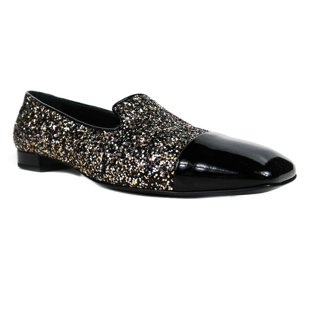 Chanel New Glitter Loafers - Silver Black Patent: Chanel - Glitter Loafers Heels Color: Silver - Black Material: Patent Leather Size: U.S 11 - 42 Details: box and dustbag included, item # AA2658, glitter design, black colored edges Condition: New wit