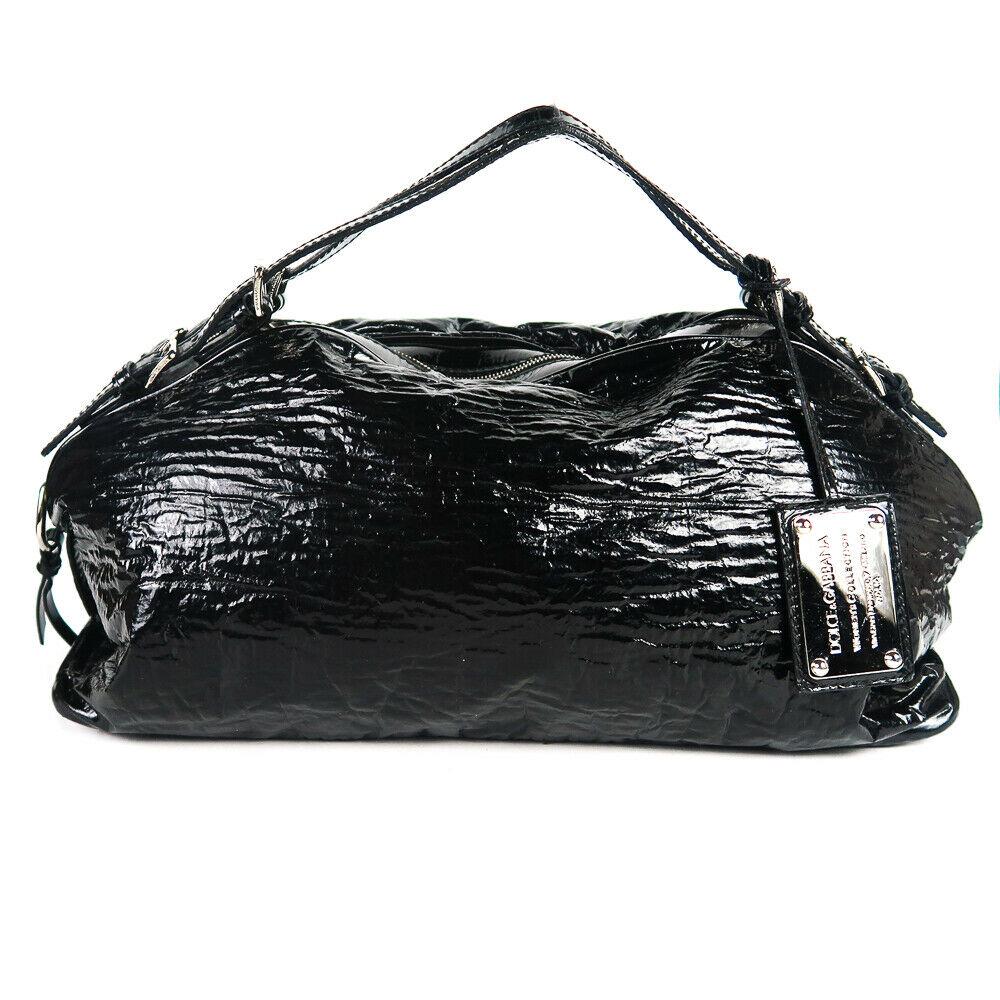 Dolce & Gabbana - Miss Bunny Black Patent Leather: Dolce & Gabbana - Miss Bunny Shoulder Bag with Leopard Print Interior Color: Black Material: Patent Leather Details: - silver-toned hardware ÃƒÂ¢_x005F_x0080__x005F_x0093_ buckles - logo plate str