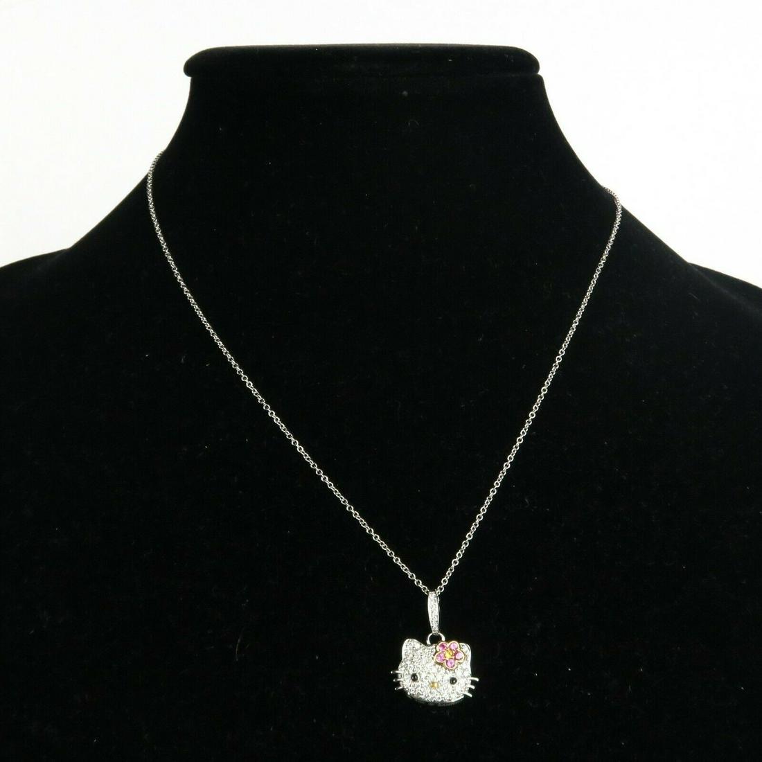 Kimora Lee Simmons -18K White Gold Hello Kitty Necklace: Kimora Lee Simmons - 18K White Gold Hello Kitty Sanrio Diamond Necklace Color: SilverMaterial: 18K White Gold------------------------------------------------------------Details:- Hello Kitty diamond c