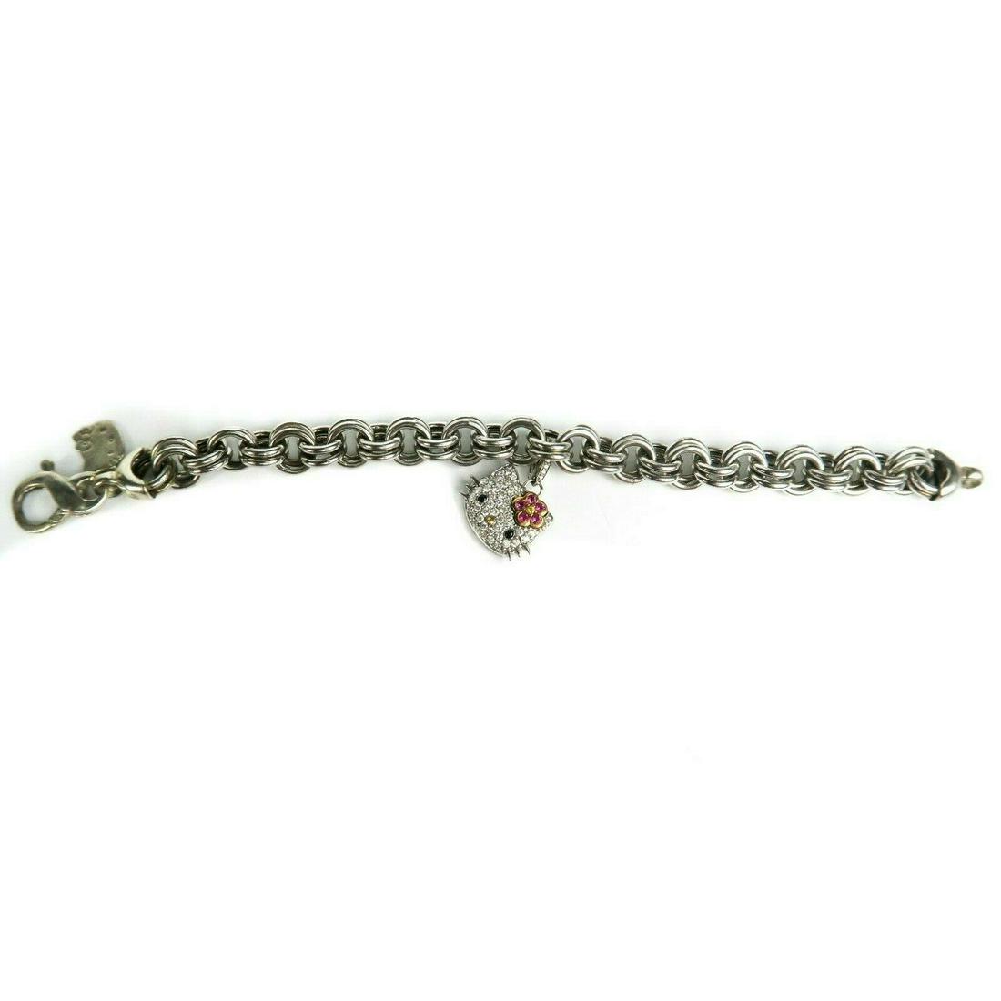 Kimora Lee Simmons - 18K White Gold Diamond Bracelet -: Kimora Lee Simmons - 18K White Gold Diamond Bracelet - Hello Kitty - Sanrio Details: - Hello Kitty diamond charm - chain link - item # SPIT126 Condition: Good Condition - gently used light wear throug