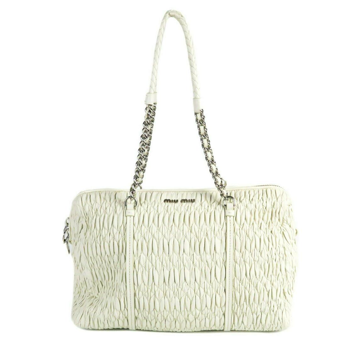 Miu Miu - White Leather Pleated Zip Top Shoudler Tote: "Miu Miu - White Leather Pleated Zip Top Shoudler Tote Bag Chain Straps - Medium Details:- pleated leather- chain link straps- zip top - item #MBAS10Measurements:Height: 9” / 23 cmLength: 13.5” / 