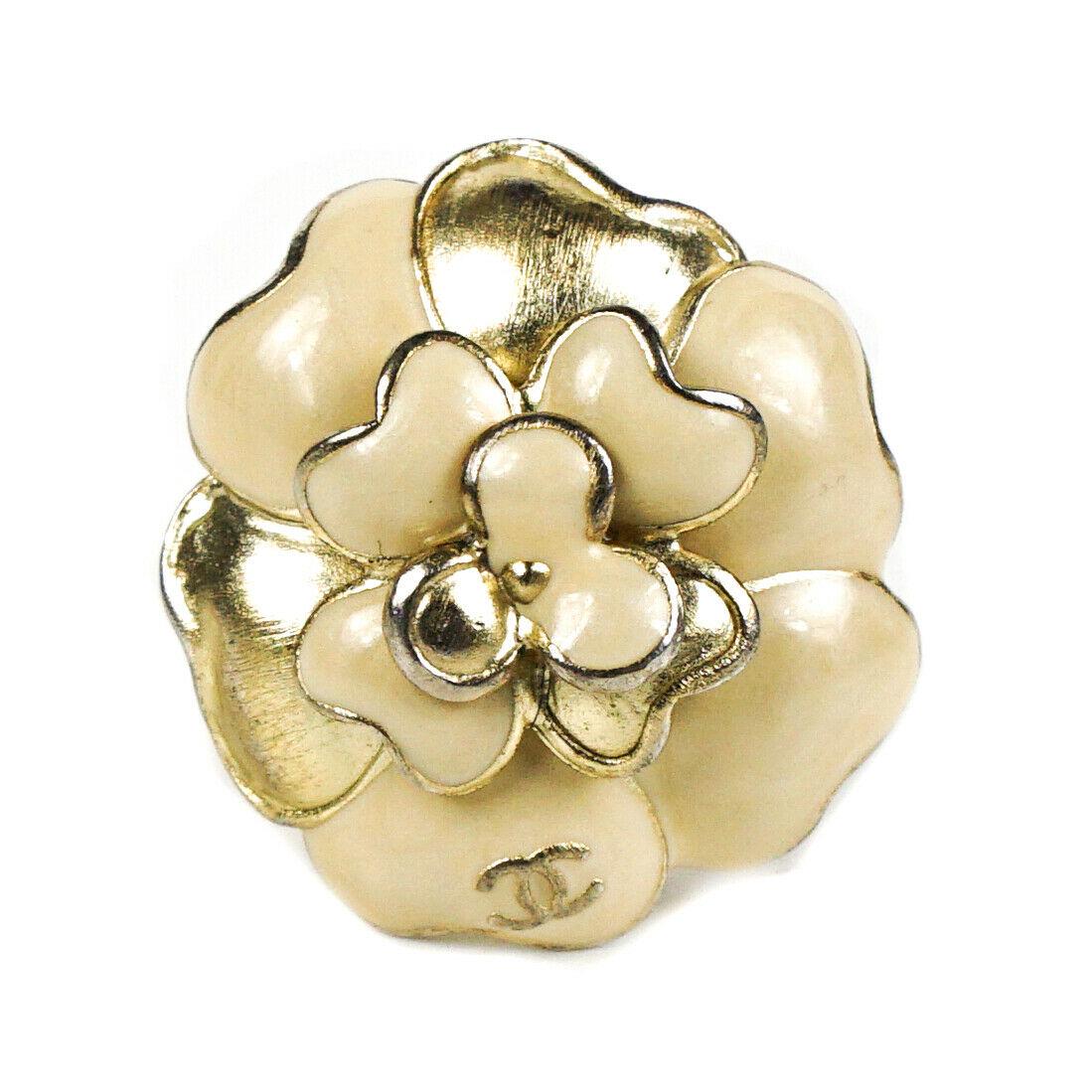 Chanel - Camellia Ring - Cream Silver - CC Flower - Box: Chanel - Camellia Cream and Silver Flower Ring w/ Box - CC - 6 Color: Silver, Cream Size: 6 ------------------------------------------------------------ Details: - CC logo - silver-tone hardware - inc