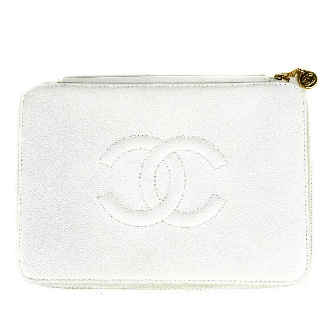 Chanel Caviar Clutch - CC Large White Leather Wallet: Chanel - Caviar Large Clutch Wallet Case with CC Logo Color: White Material: Caviar Leather ------------------------------------------------------------ Details: - zip around - gold tone hardware - CC
