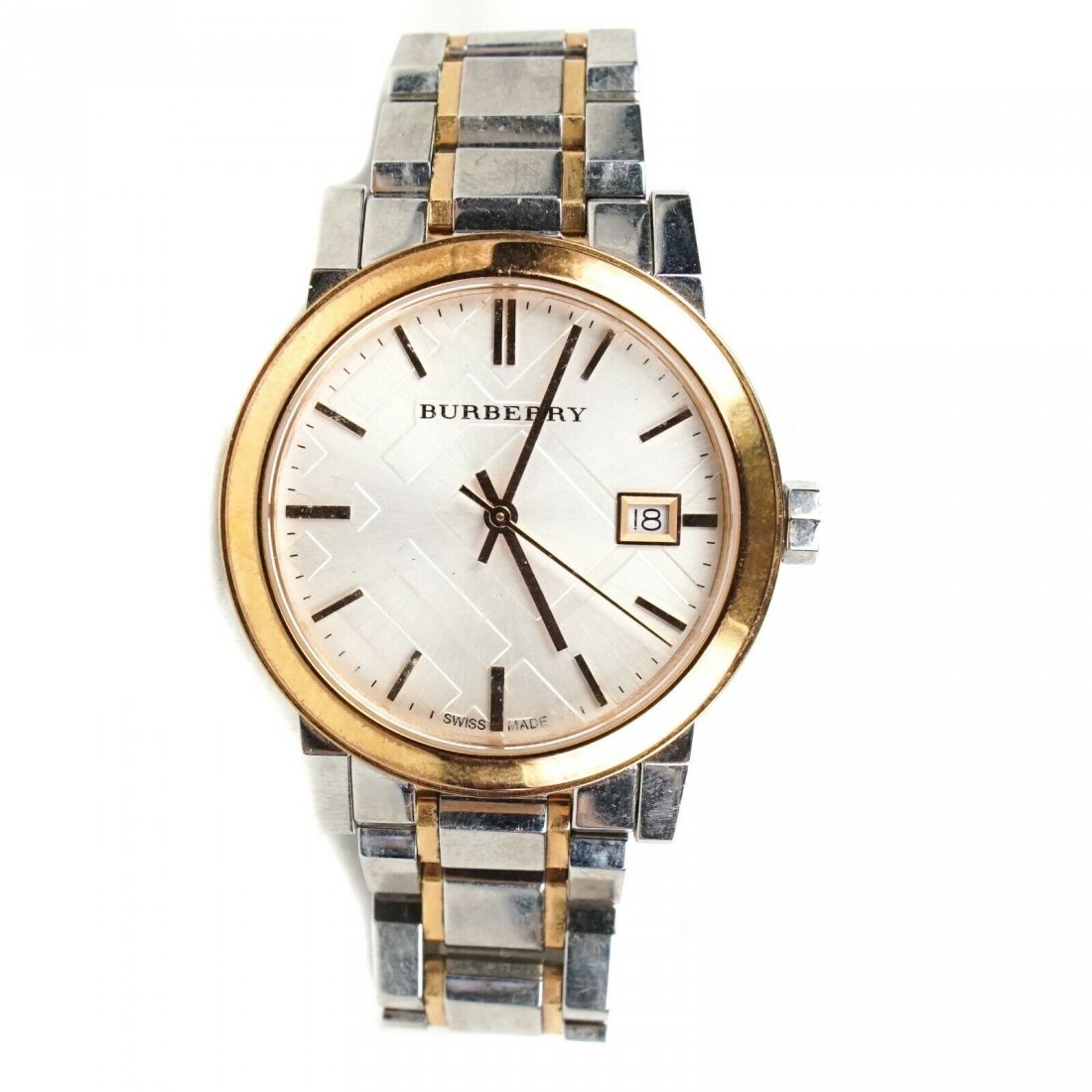Burberry - City Watch - Gold Bezzle - Stainless Steel: Burberry - City Watch Color: Gold, White and Silver Material: Stainless Steel ------------------------------------------------------------ Details: - gold bezzle - circle face - analog - item # KJAC91