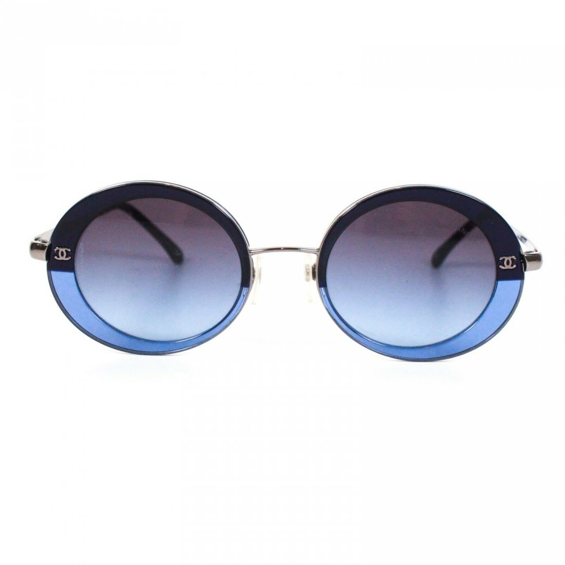 Chanel - Two-Tone Blue Round Sunglasses - Vintage CC: Chanel - Two-Tone Blue Round Sunglasses Color: Blue - multi-color Material: Metal, glass ------------------------------------------------------------ Details: - fading lenses - silver tone hardware - 