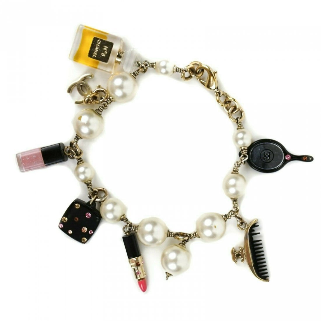 Chanel - RARE - Make Up Pearl Charm Bracelet: Chanel - Make Up Pearl Charm Bracelet Color: Silver - Pearl ------------------------------------------------------------ Details: - CC, perfume, makeup charms - silver-tone hardware - pearl detail - i