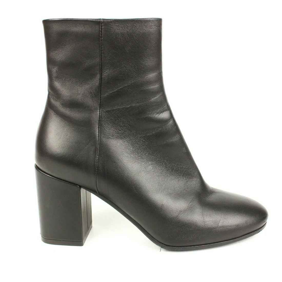 Balenciaga - Logo Block Heel Boots Size: US 6 - 36: Balenciaga - Logo Block Heel Boots Size: US 6 - 36 Color: Black Material: Leather ------------------------------------------------------------ Details: - zipper closure - round toe - block heel - item