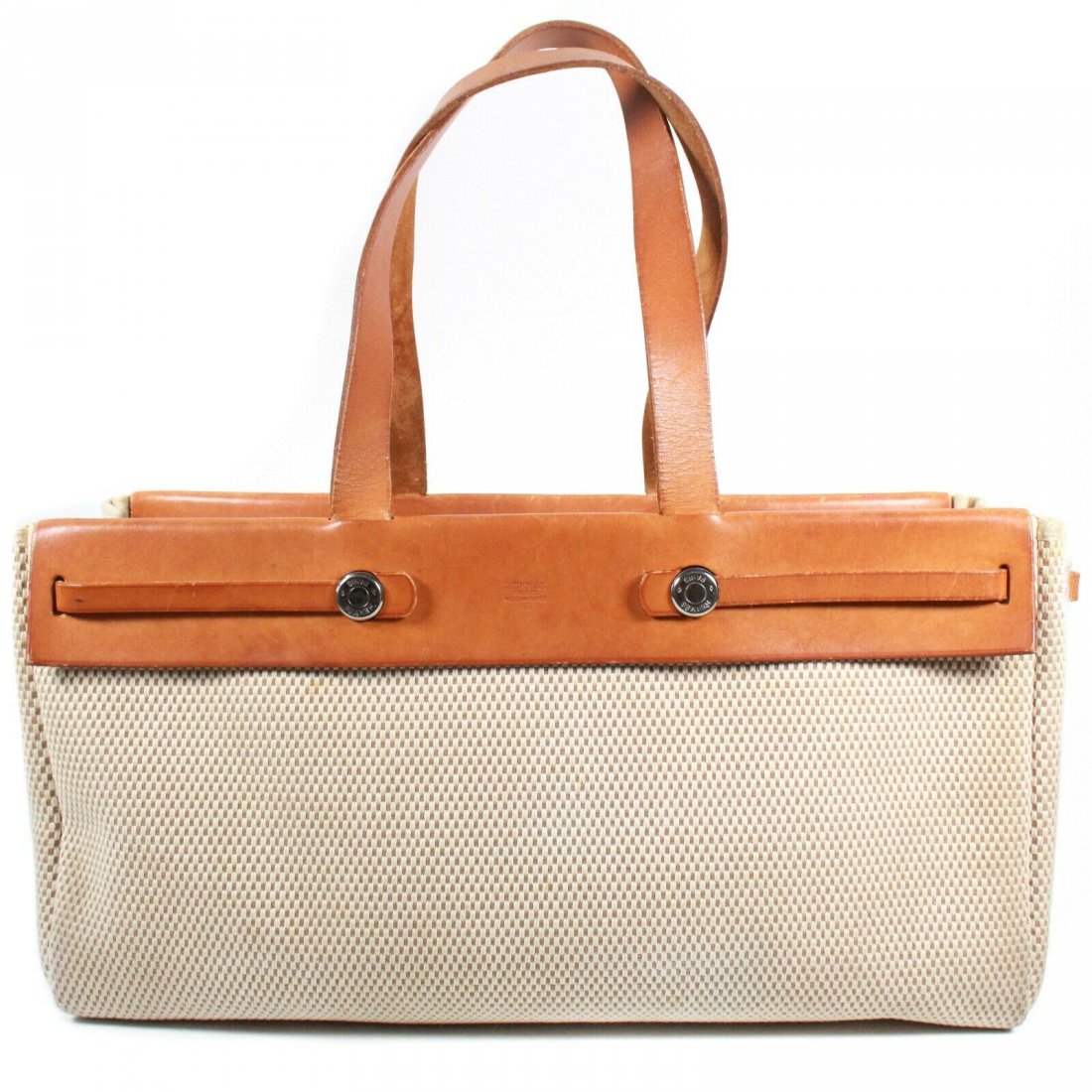 Hermes - Her Bag Tote - Cream Canvas Mesh - Medium: Hermes - Her Bag - Tote Color: Cream, Tan, Silver Size: Medium Material: Canvas Mesh, Leather ------------------------------------------------------------ Details: - silver-tone hardware - item #VEBR9