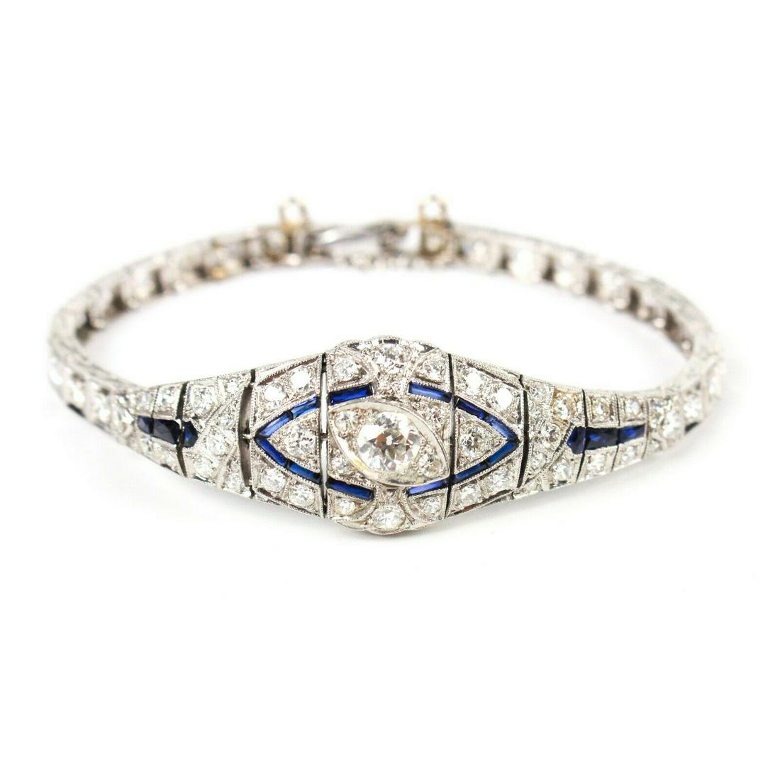 Art Deco Bracelet - Platinum Diamond - Sapphire - 6.5": Bracelet - Platinum Art Deco Bracelet Diamond 1/2 ct in middle (3.76 total ct of diamonds) Synthetic Sapphire 14.1 dwt Material: Platinum - Diamond - Synthetic Sapphire -------------------------------