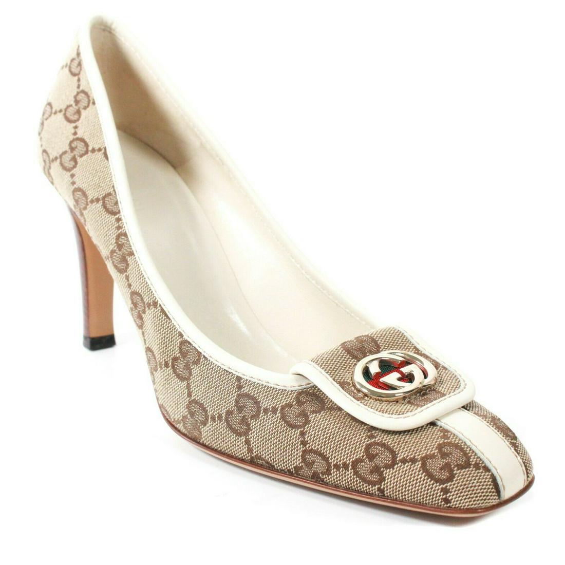 Gucci - GG Monogram Pumps - Web Stripe - US 9: Gucci - GG Monogram Pumps - Web Stripe - Wooden Heel Size: 9B - US 9 Color: Brown, Tan, Green, Red Material: Canvas, Wood, Leather ------------------------------------------------------------ Details: