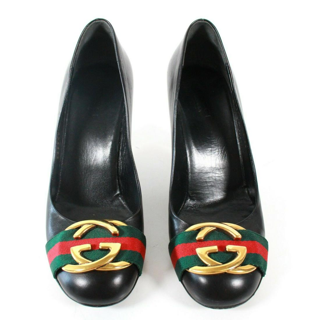 Gucci - Black Heels - Gold GG - Web Stripe - 36 - US 6: Gucci - Black Heels - Gold GG - Red Green Stripes - 36 - US 6 Color: Black Size: 36 - US 6 Material: Leather ------------------------------------------------------------ Details: - item #JTHU54 Condit