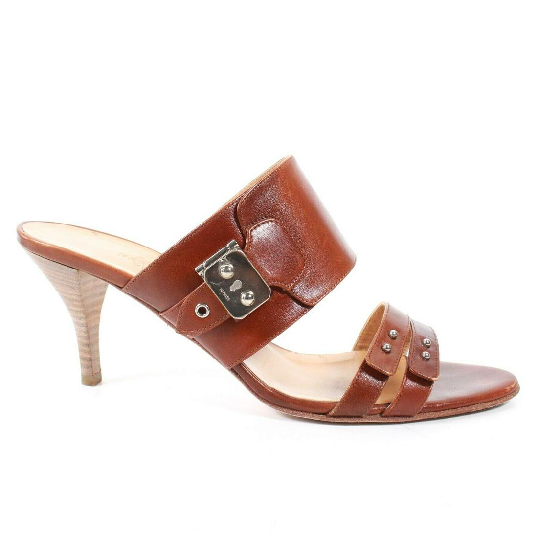 Hermes - Heels - Sandals - Straps - Wood Heel - 8.5: Hermes - Heels - Sandals - Straps - Wood Heel Color: Tan Size: 39 - US 8.5 Material: Leather ------------------------------------------------------------ Details: - lace wrap tassels - open toe - stra