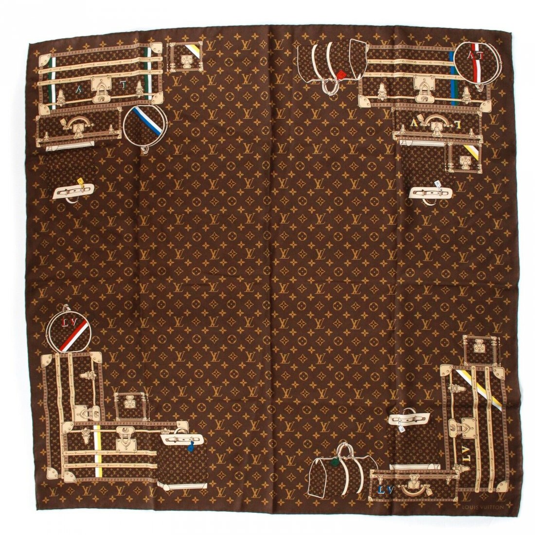 Louis Vuitton - Trunk Silk Scarf - Monogram LV Luggage: Louis Vuitton - Trunk Silk Scarf - Monogram LV Luggage Print Color: Brown Material: 100% Silk ------------------------------------------------------------ Details: - item #JTHU37 Condition: Excellent 
