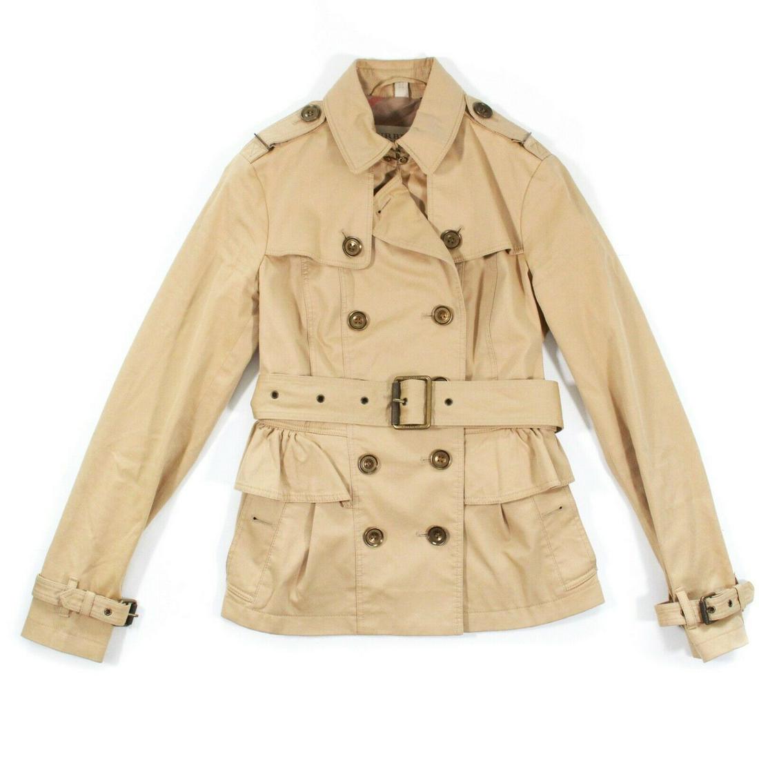 Burberry Brit - Short Belted Trench Coat - Women's US 2: Burberry Brit - Womens Trench Coat Short Belted Jacket Color: Tan Material: 97% Cotton , 3% Elastane Size: US 2 - Womens ------------------------------------------------------------ Details: - item #J