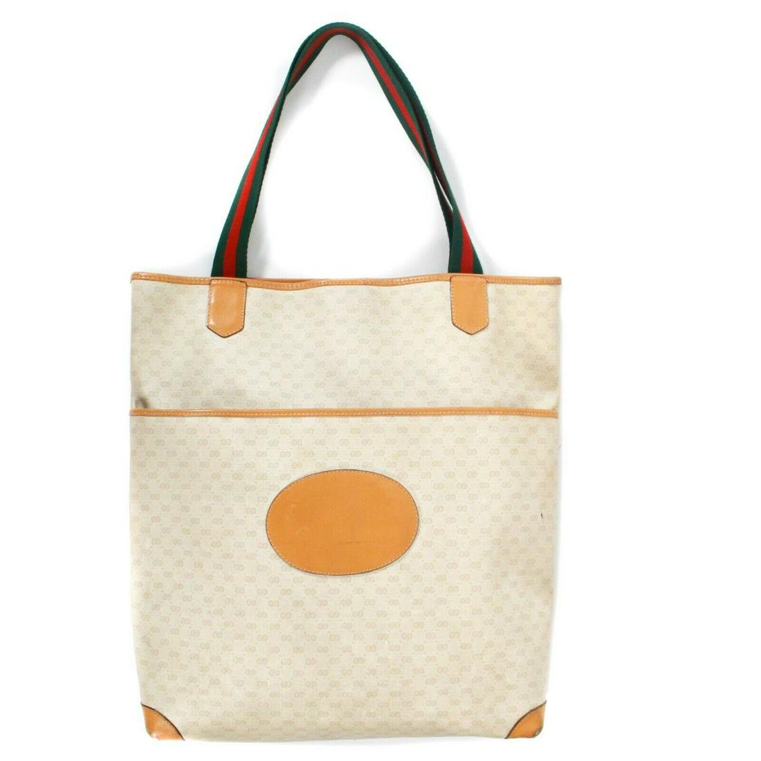 Gucci - Vintage GG Monogram Tote - Web Stripes - Large: Gucci - Vintage GG Monogram Tote Color: Cream, Tan, Green, Red Material: Canvas, Leather ------------------------------------------------------------ Details: - tan leather accents - large front pocke