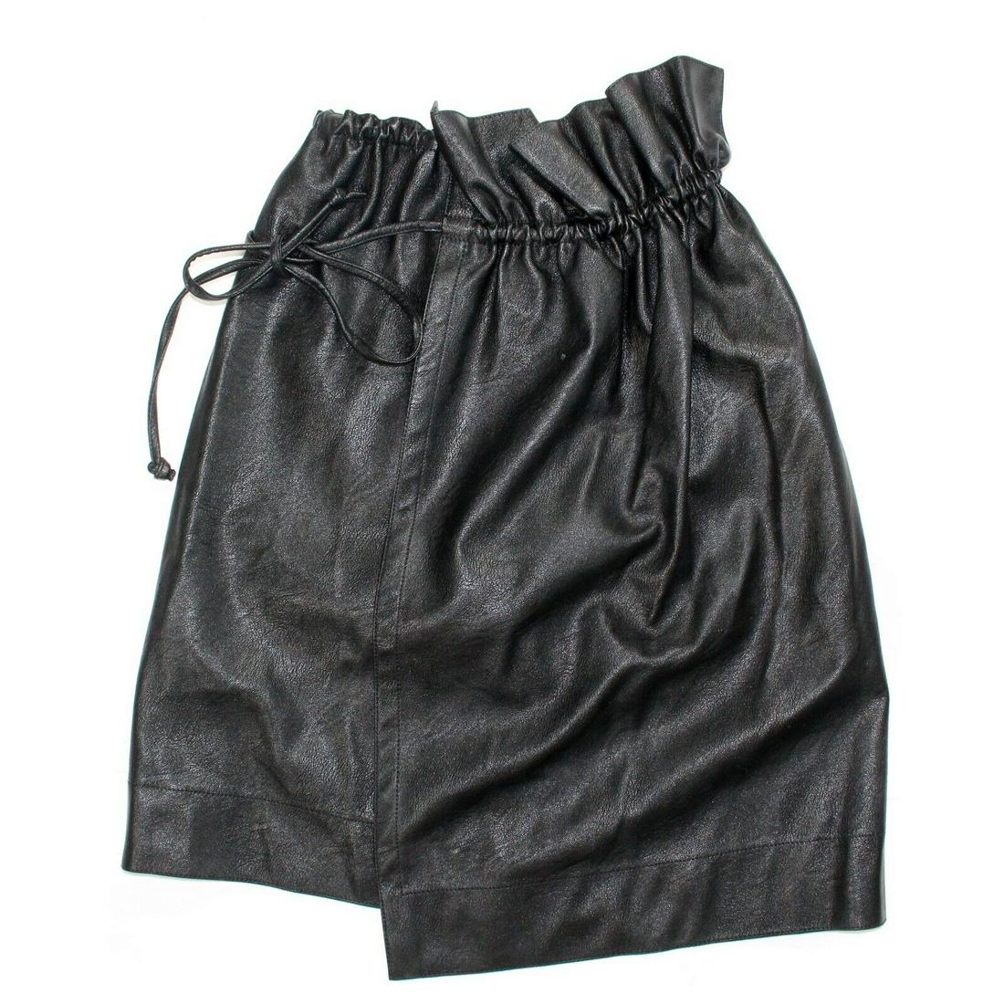 Stella McCartney - Black Vegan Leather Skirt -: Stella McCartney - Black Vegan Leather Skirt - Drawstring Waist Size: IT 40 - US 4 Color: Black Material: 62% Polyester, 38% Viscose ------------------------------------------------------------ Detail