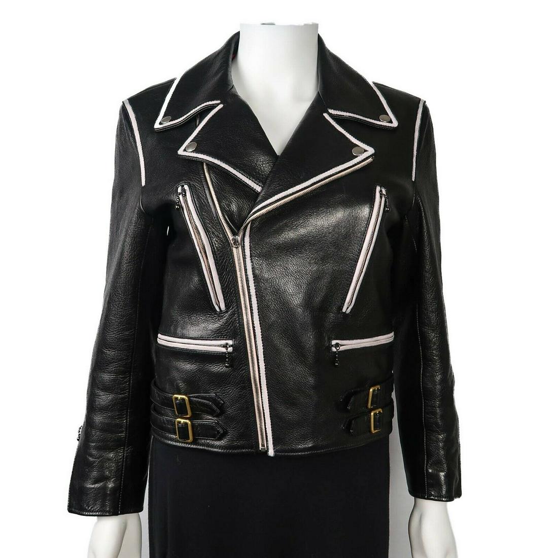 Gucci - 2017 Black Leather Zip Up Jacket Retail:: Gucci - 2017 Black Leather Zip Up Jacket Retail: $5000.00 Size: Womens IT 38 - US 0 Color: Black - White Material: Leather ------------------------------------------------------------ Details: - long 