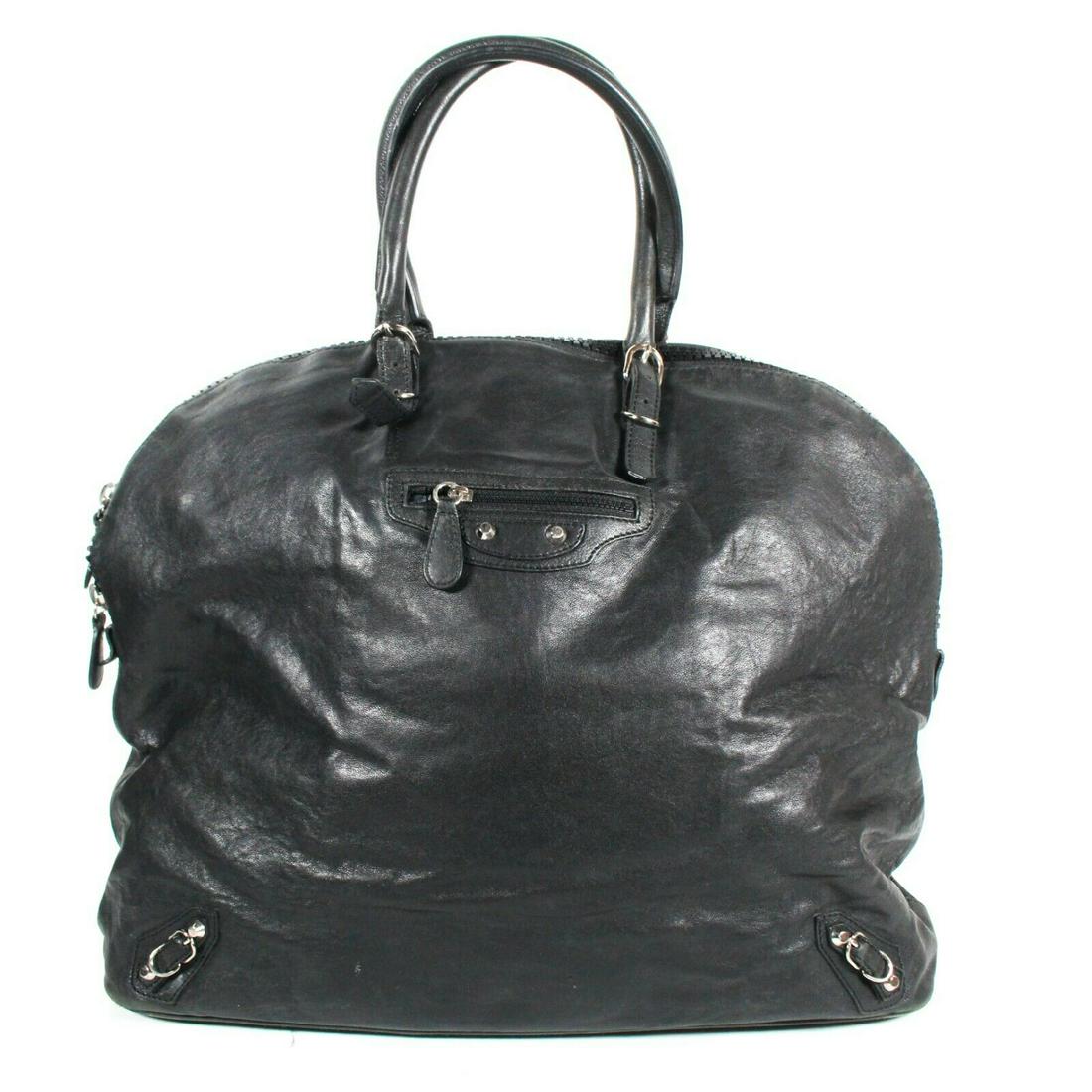 Balenciaga - Rare Large Dome Moto Tote Bag Color:: Balenciaga - Rare Large Dome Moto Tote Bag Color: Black Size: Large Material: Lambskin Leather ------------------------------------------------------------ Details: - silver-tone accents - black zippe