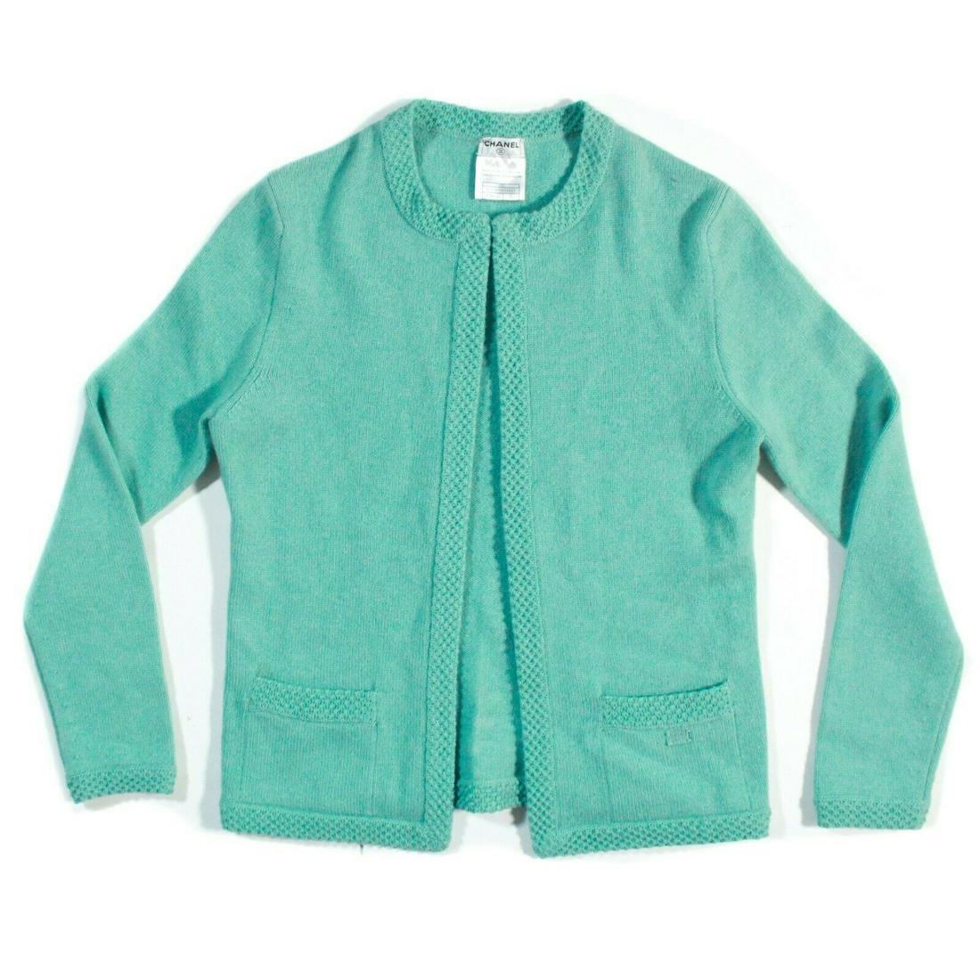 Chanel - Spring 2005 Cashmere Cardigan Sweater - 4: Chanel - Spring 2005 Cardigan Sweater Jacket Color: Teal Green / Blue Size: US 4 - FR 36 Materials: Cashmere ---------------------------------------------------------------------------- Details: - two