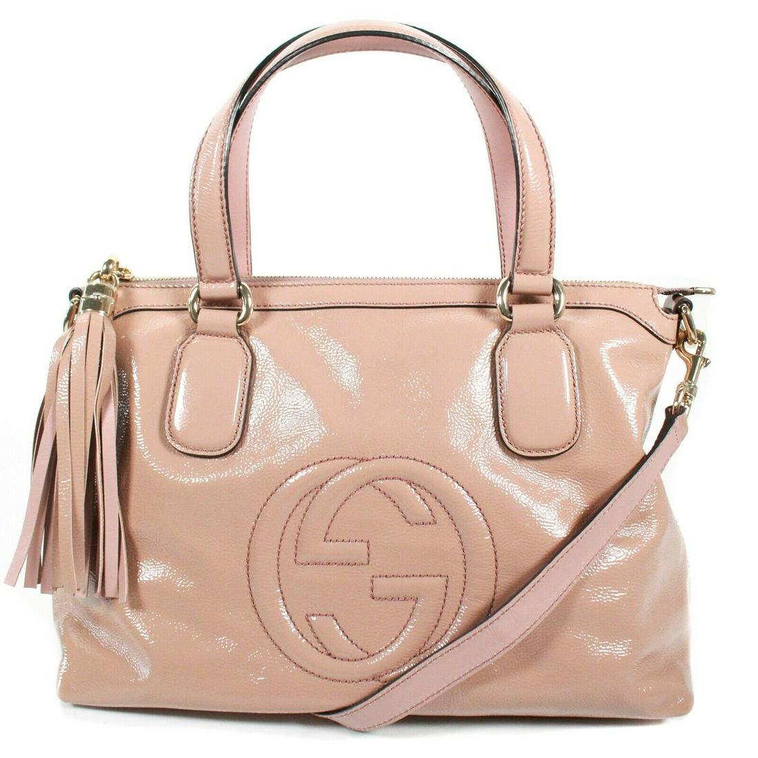 Gucci - Soho Medium Nude Pink Patent Leather GG Bag: Gucci - Soho Medium Nude Pink Patent Leather GG Bag Tassel Detachable Strap Color: Nude Pink Size: Medium Material: Patent Leather ------------------------------------------------------------ Details: