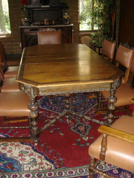 Spanish Revival Dining Room Set, circa 1920: Table and 8 chairs