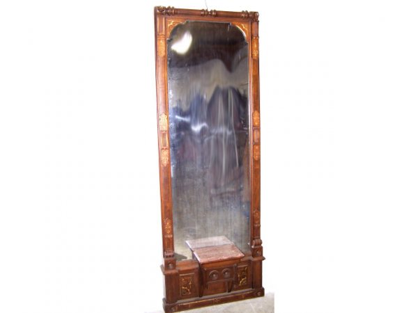 Extraordinary Victorian Pier Mirror: A fine giltwood accented 1870s LARGE pier mirror. Item is walnut with fine details. Original mirror. Marble shelf. Almost 9 ft. tall. A stunning statement item.