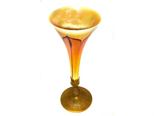 Large Tiffany Pulled Feather Bronze Base Vase: A fine LCT signed glass insert, and signed Tiffany Studios bronze base. 14" tall together. Some MINOR water wear is shown on interior of glass vase, great overal colorations on outer glass area.
