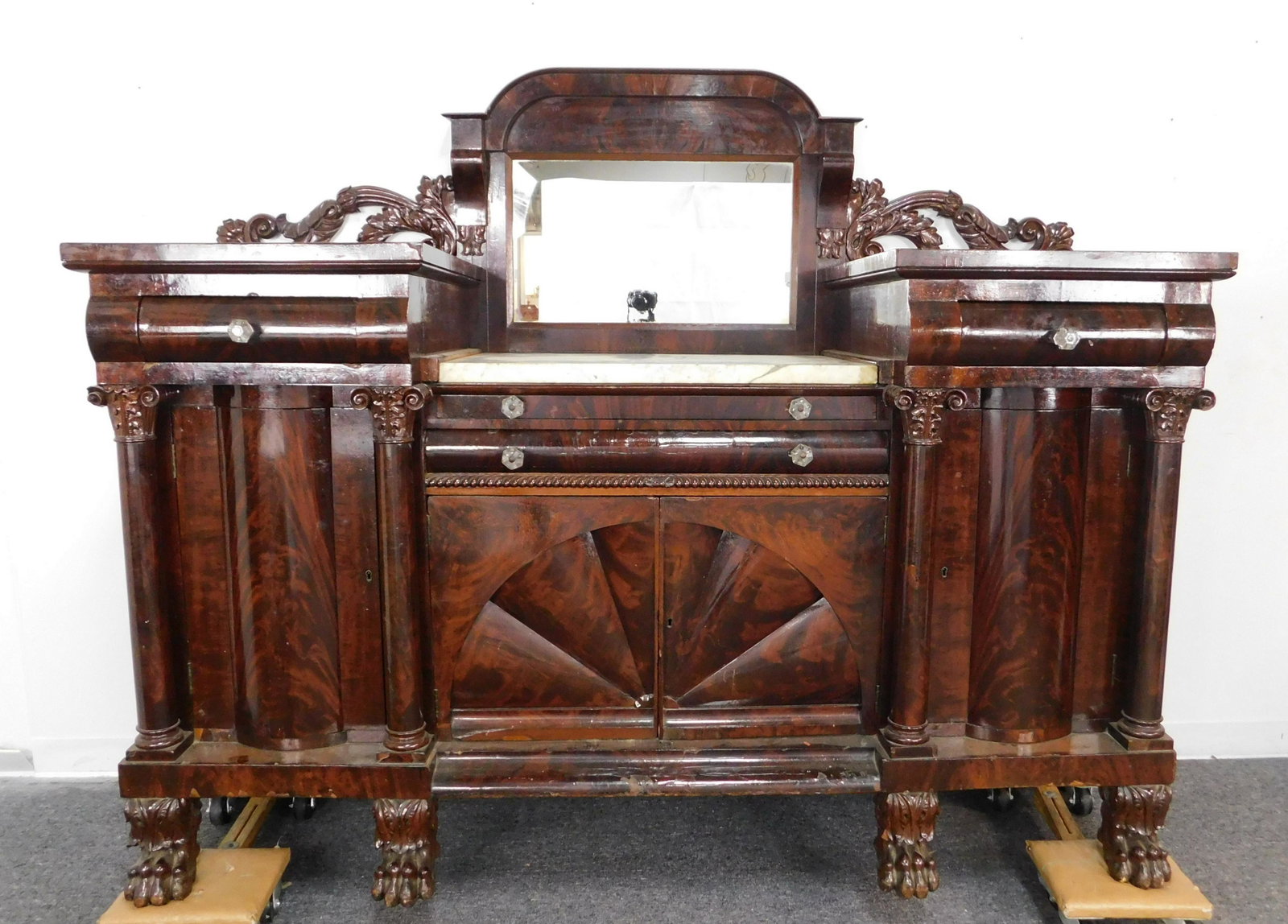 Antique Mahogany Marble Top Federal Sideboard: Antique Mahogany Marble Top Federal Sideboard, Mirror Back, Six Legs, Hairy Paw Feet, Column Front, Glass Pulls, Shows some wear with veneer and other pieces of trim may need some repair all consisten