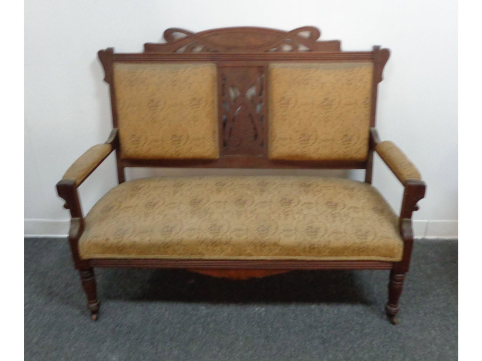 Victorian Settee: Victorian Settee. Structurally in good shape, upholstery could use updating. Walnut Frame. 40.5''H x 51.5''W x 24''D