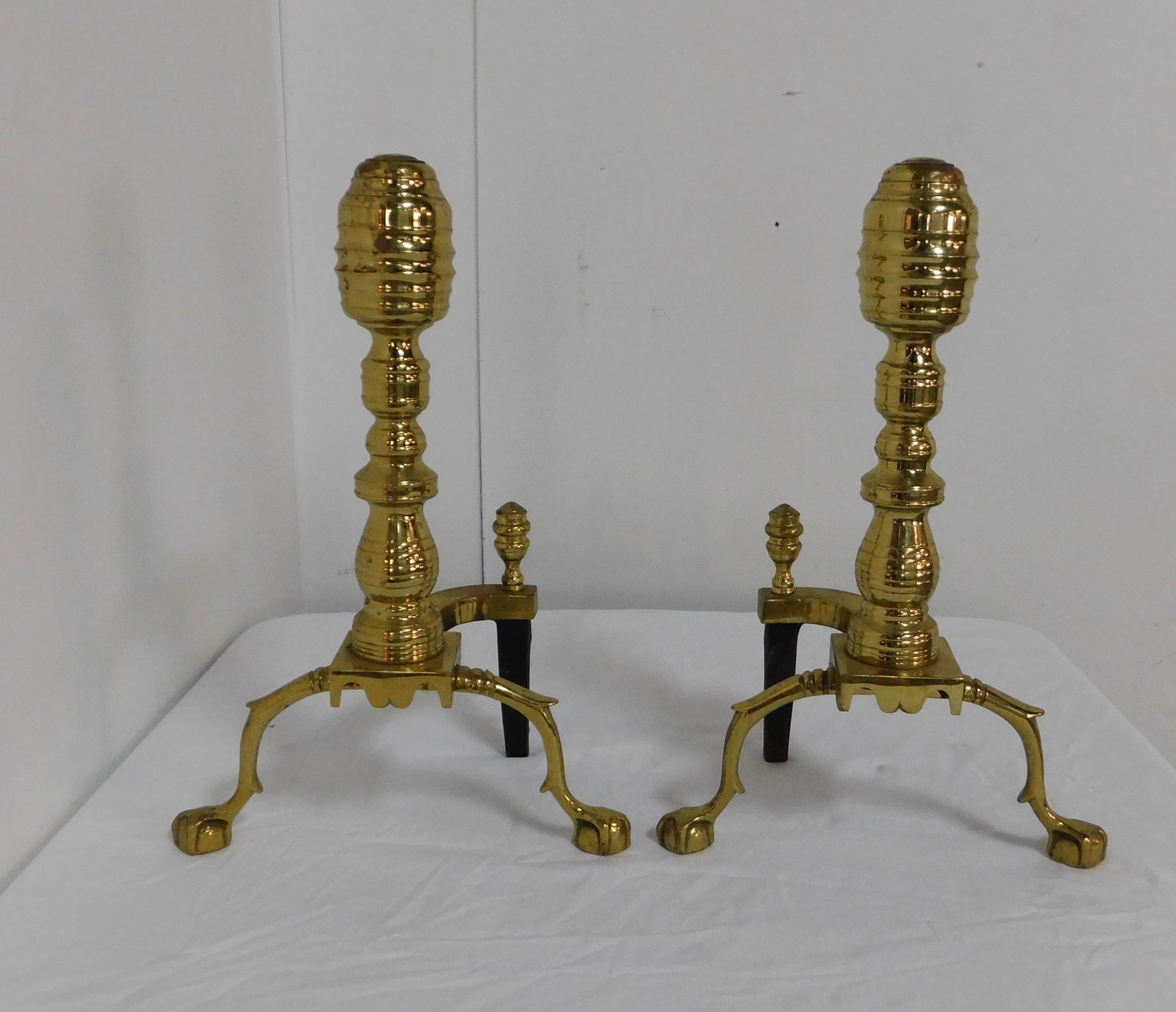 Williamsburg Style Harvin Ball and Claw Andirons: Williamsburg Style Harvin Branch Foot Ball and Claw Bee Hive Posts Andirons in good condition, 19''H x 13''W x 8''D