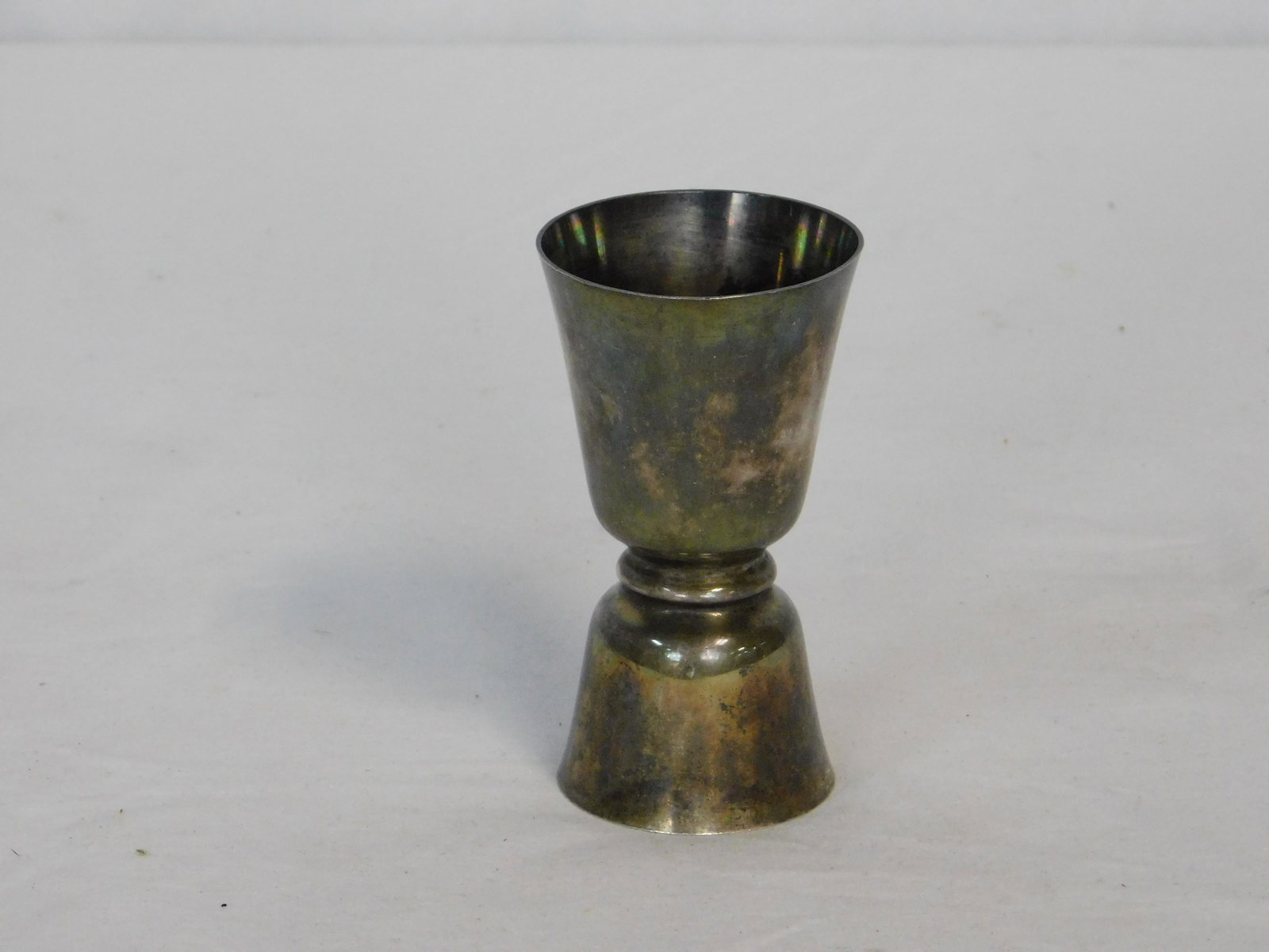 Kirk & Sons Sterling Silver 1&2 Oz Shot Measure: Kirk & Sons Sterling Silver 1&2 Oz Shot Measure. 3.75" H in good condition with one small indention.