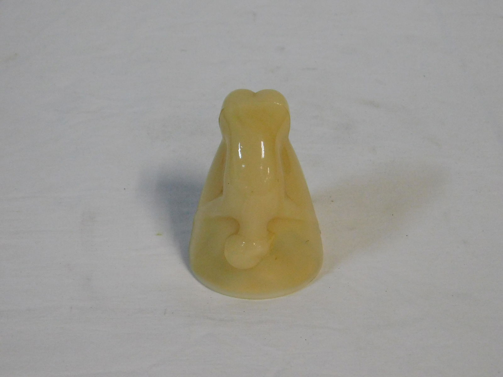 Vintage Carmel Glass Bottoms Up Shot Glass: McKee Glass Bottoms Up Nude Shot Glass. Vintage marked Pat 77725 - under nude's feet. 3.25"H in good condition.