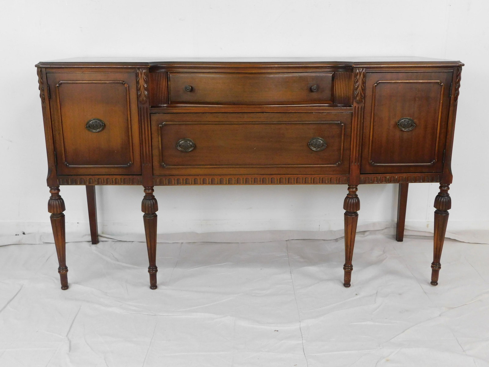 Antique Mahogany Sideboard: Antique Mahogany Sideboard in good condition, Six Legs, Lined Silverware Drawer, 38''H x 66''W x 22''D