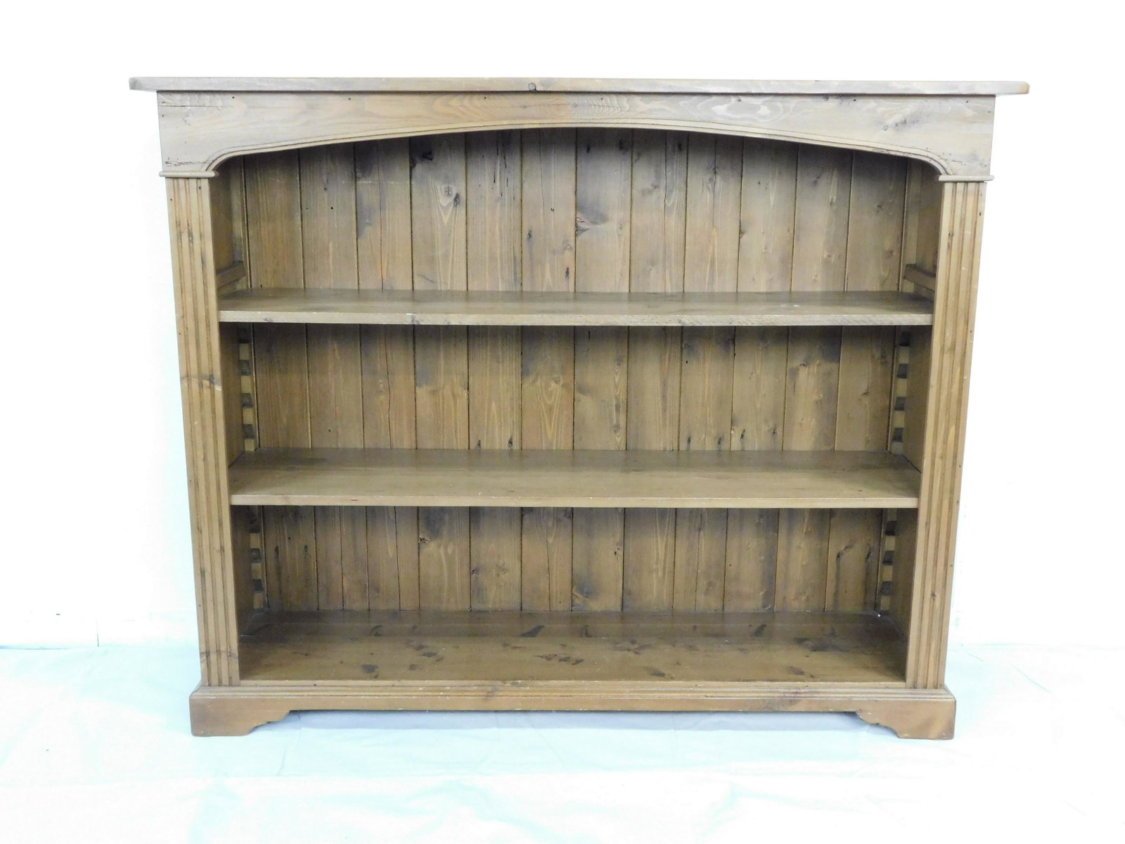 Antique Pine Bookcase: Antique Pine Bookcase in good condition, with three adjustable shelves, Paneled Back, 45.5''H x 56.5''W x 16''D