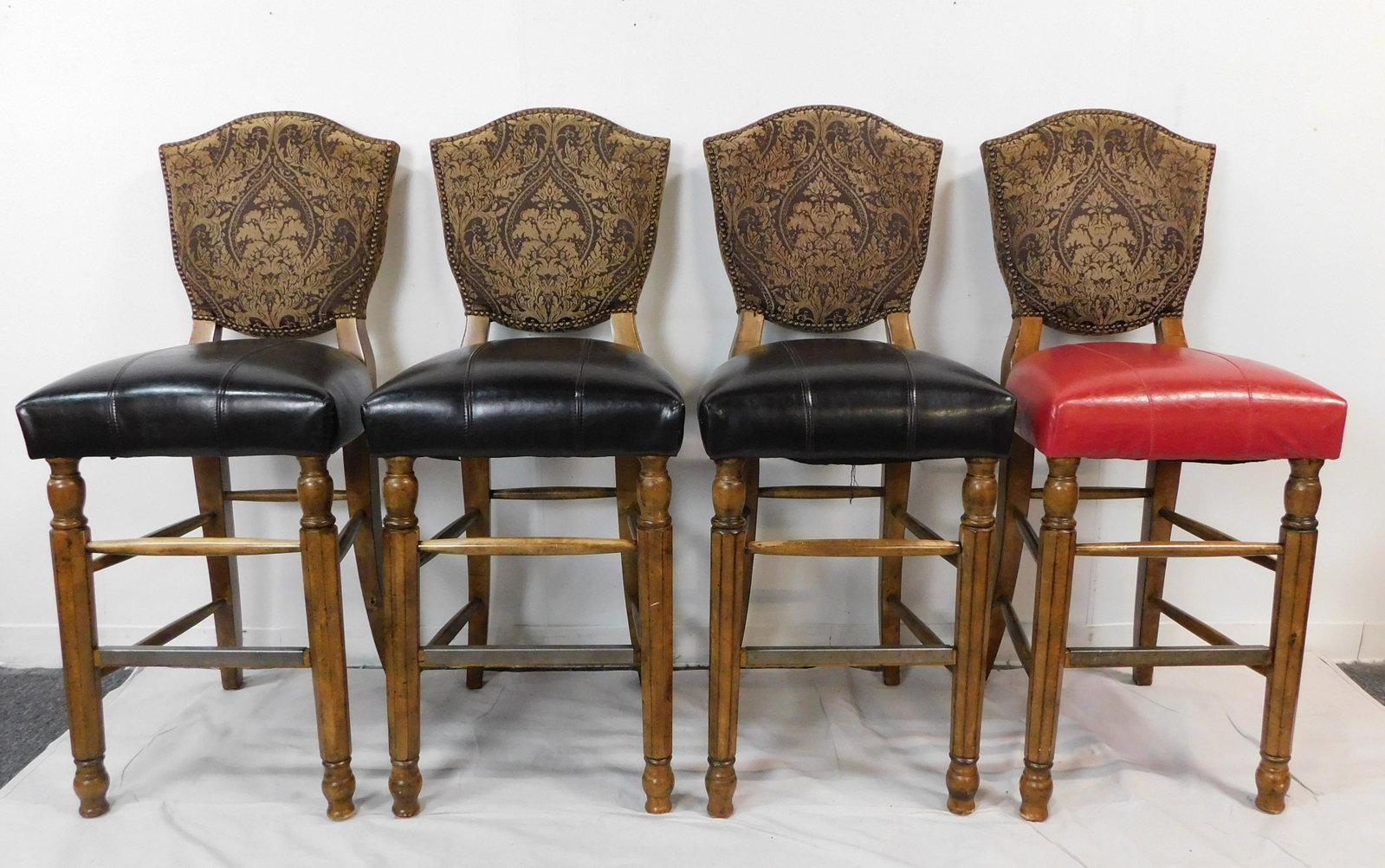 Set of Four Barstools: Set of Four Barstools in good condition with light wear to seats, Upholstered Backs, Three with Dark Brown Seats, One with Red Seat, 48''H x 20.5''W x 24.5''D Seat Height 31''