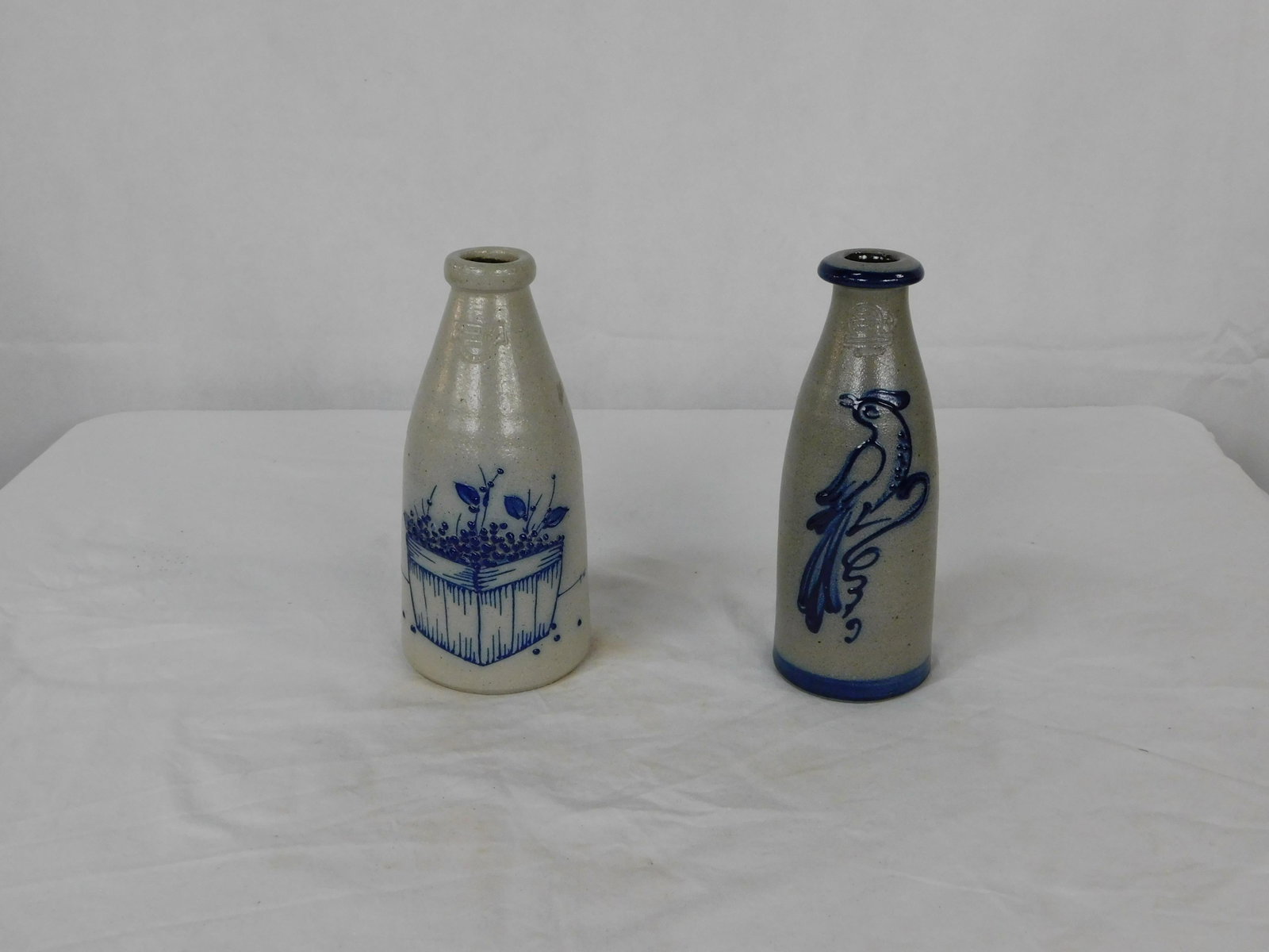 Salmon Falls and Rowe Pottery Bottles: Salmon Falls and Rowe Pottery Bottles in good condition, Cobalt, 9''H