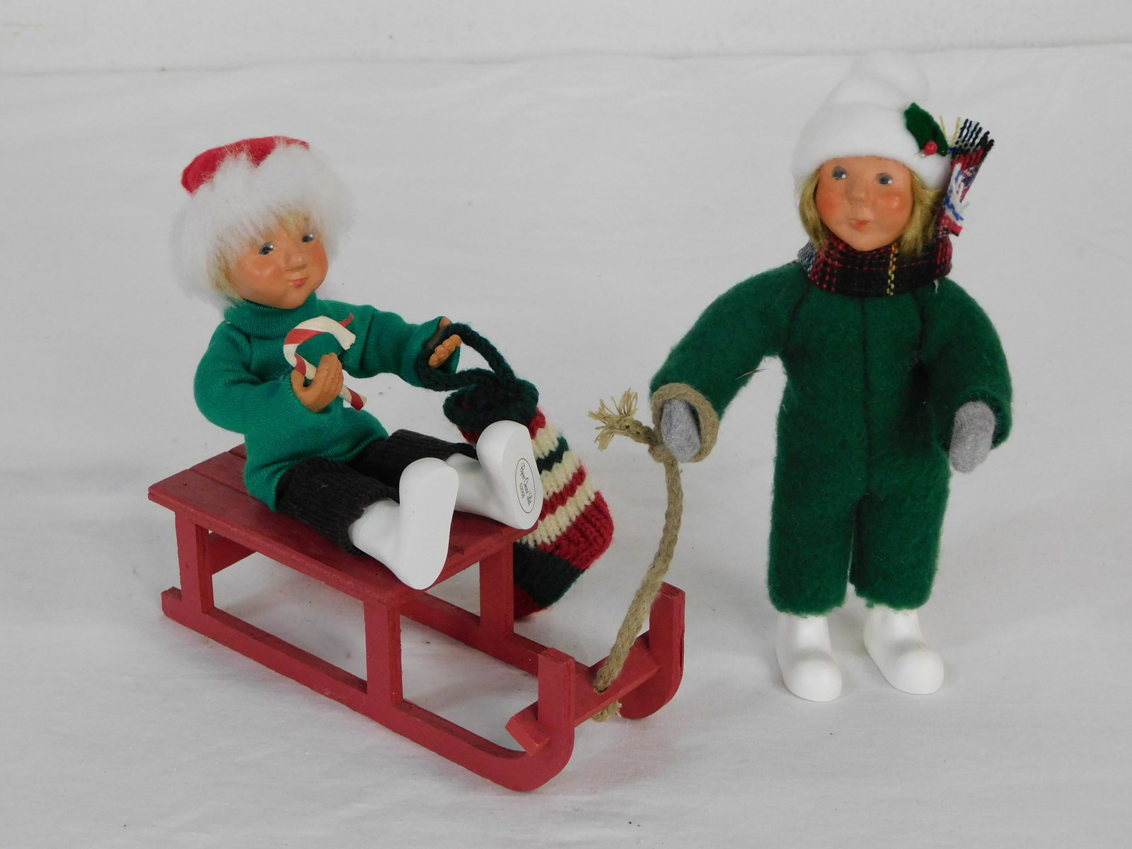 2 Byers Carolers 2006 Toddler & Sled w/Companion: 2 Byers Carolers 2006 Toddler & Sled w/Companion. Companion Girl is 6.5" tall in good condition.