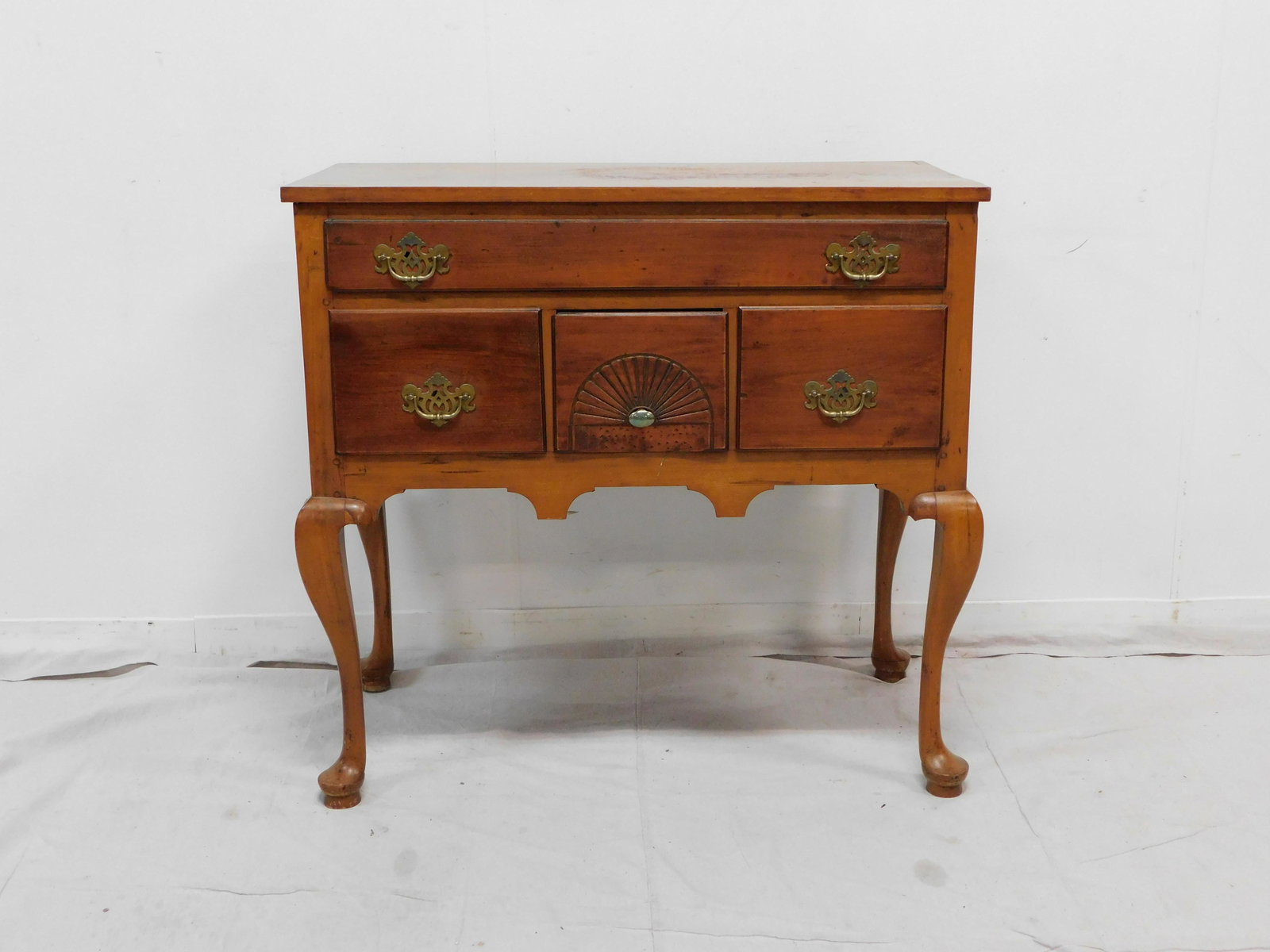 Antique 19th Century Cherry Colonial Style Lowboy: Antique 19th Century Cherry Colonial Style Lowboy, Pegged construction around case, Cabriole legs with pad feet, Dovetailed drawers, Shell carving, brass hardware, 36''H x 39''W x 20.5''D, in good con