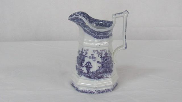 Early Mulberry Ironstone Transfer Ware Pitcher: Early Mulberry Ironstone Transfer Ware Pitcher in good condition with crazing as consistent with age, small chip on rim as shown in photos, 8.5''H x 6.5''W